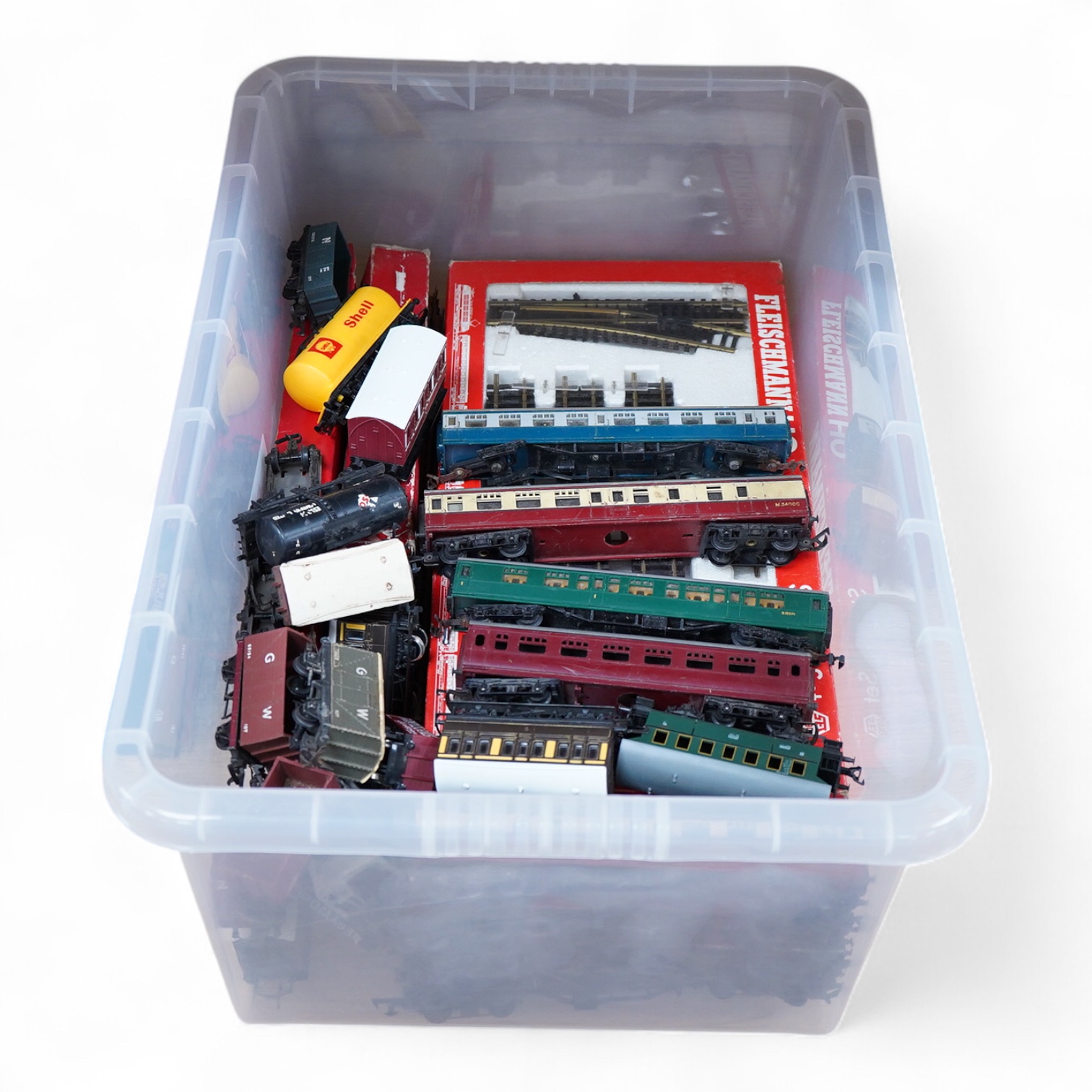 A quantity of HO and 00 gauge railway, comprising; twelve locomotives including a boxed Fleischmann 0-4-0 catenary electric locomotive, a Hornby Dublo Duchess of Atholl, etc. eleven bogie coaches, sixteen freight wagons,